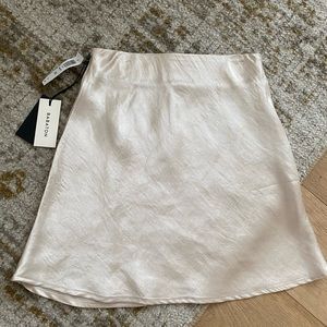 Aritzia Mini Slip Denude Skirt